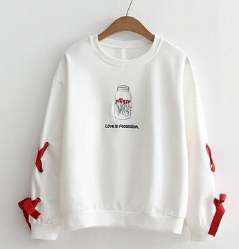 'Love is Possession.' Lace-Up Embroidery Sweatshirt